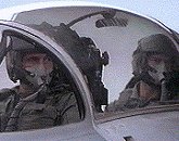 Kelly and Bobby in a two-seater